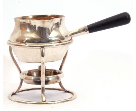 George V silver brandy saucepan warmer on burner stand, having a plain round baluster body, a sparrow-beak spout with origina