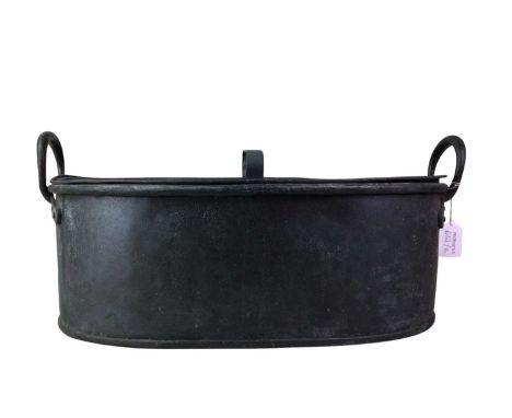 CAST METAL FISH STEAMER, ALONG WITH AN OAK CASED MANTEL CLOCK the steamer with twin handles and lid, along with an oak cased 