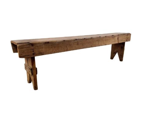 PINE BENCH, 20TH CENTURY  of rectangular form, with V cut supports 45cm x 168cm
