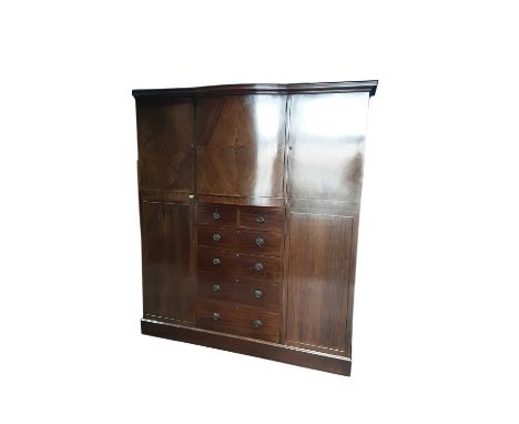 EDWARDIAN MAHOGANY BEDROOM SUITE, comprising wardrobe, dressing table with triple mirror and a bedside cabinetwardrobe 216cm 