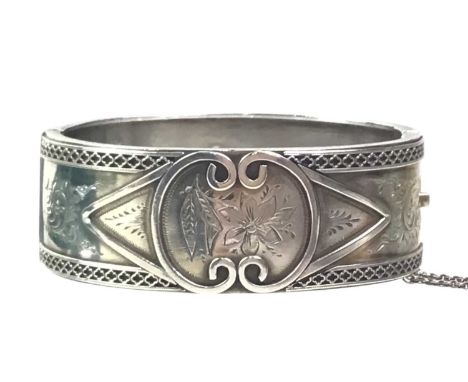 VICTORIAN SILVER BANGLE, decorated to the obverse, Birmingham 1884