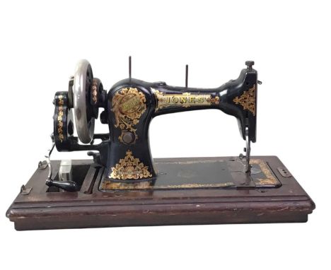 VINTAGE HAND SEWING MACHINE, EARLY 20TH CENTURY cased in oak51cm wide