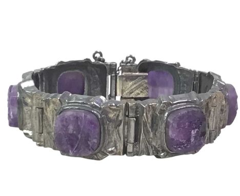 FINNISH 830 SILVER BRACELET, with amethyst set linksOverall good condition, with no signs of damage. Clasp works well, and no