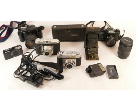 A collection of mixed cameras and accessories to include two digital compact cameras, a Minolta 16 and two vintage film SLR c
