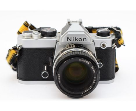 A Nikon FM vintage film SLR camera with 50mm lens, serial no FM3264995 