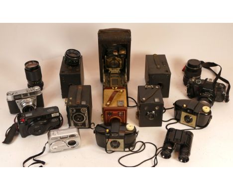 A collection of mixed cameras and accessories to include three lenses, five box cameras, three digital compact cameras and th