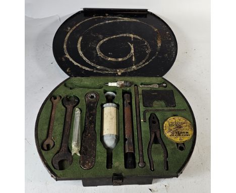 A Daimler/Jaguar MkII metal tool kit, lacking small adjustable spanner 