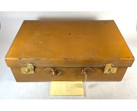 A Royal Horse Guards leather trunk, early 20th century, stamped to the top "T" and "Royal Horse Guards" 76cm x 46cm 