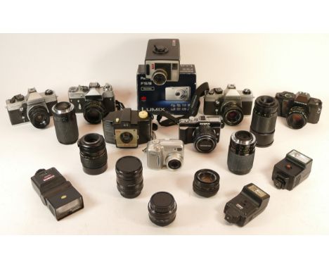 A collection of mixed cameras and accessories to include eight lenses, a Kodak Cresta Brownie, five digital cameras, a Rollei