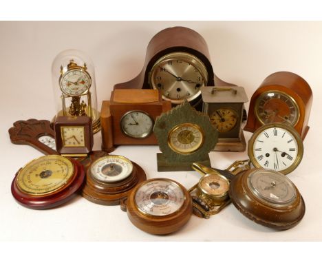 A collection of mid 20th century mantel clocks and barometers, having manual and quartz movements. (3) 