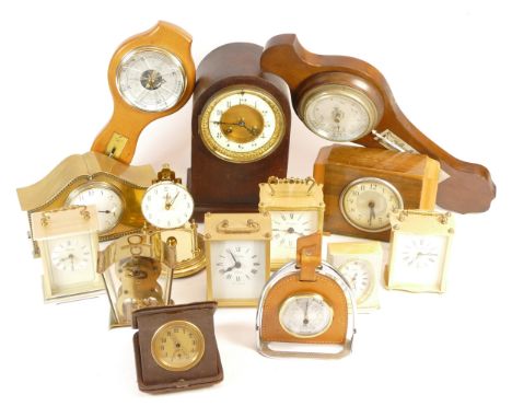A collection of mid 20th century mantel clocks and barometers, having manual and quartz movements. (3) 