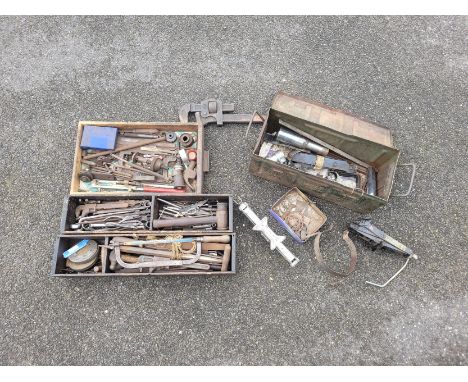3 x wooden trays containing various hand tools, 1 x metal box containing car jacks and spares, 1 x large pipe wrench. 