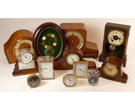 A collection of mid 20th century mantel clocks and barometers, having manual and quartz movements. (3) 