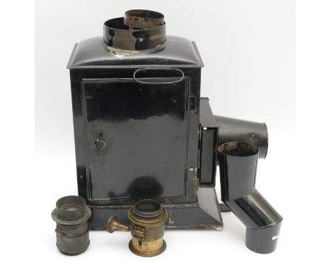 A 19th century Phantasmagoria type lantern, circa 1850, having high crooked chimney, brass screw in lens, wick oil lamp, orig