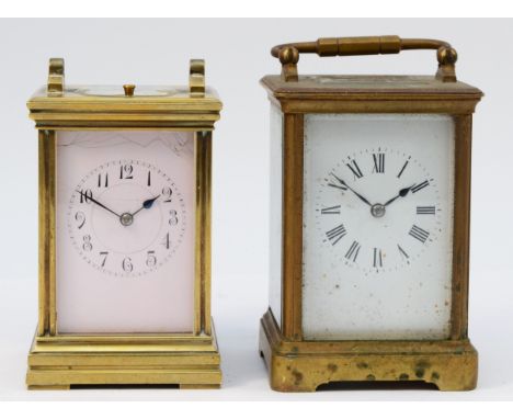 A 20th century English brass carriage clock, the enamelled dial with Arabic numerals, housing 8 day movement striking on gong