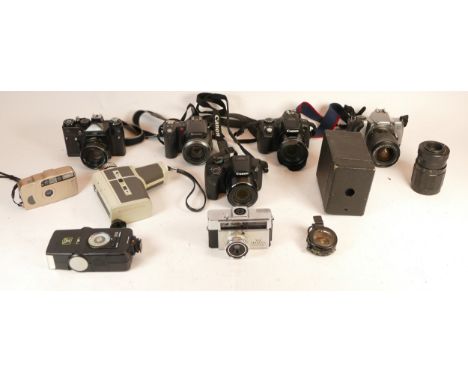 A collection of mixed cameras and accessories to include three lenses, four digital compact cameras and a Zenit 11 vintage fi