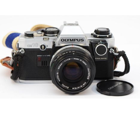 An Olympus OM10 vintage film SLR camera with lens, serial no 2511547 