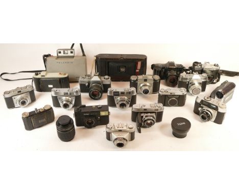 A collection of mixed cameras and accessories to include a Polaroid 320, eleven vintage film cameras and three vintage SLR ca