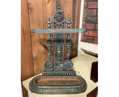 A cast iron stick/umbrella stand, with removable drip tray, height 56cm. 