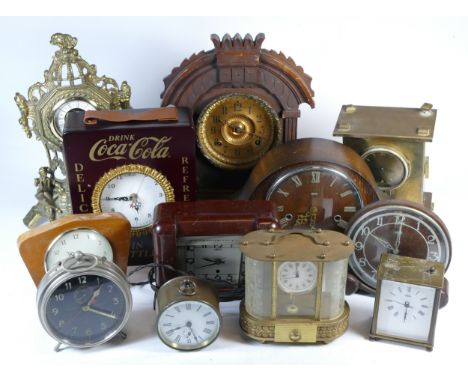 A collection of mid 20th century mantel clocks and barometers, having manual and quartz movements. (4) 