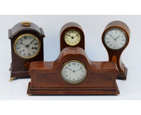 Four Edwardian inlaid mahogany mantel clocks, having 8 day manual wind movements, tallest 23cm tallest. (4) 