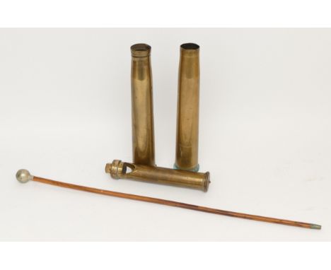 A Royal Engineers swagger stick, 68cm long, together with brass shell cases. 