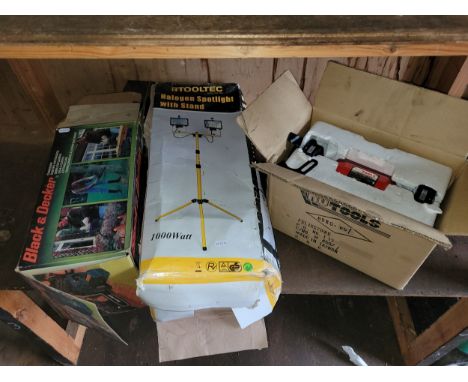 Tooltec halogen spotlight and stand, Black and Decker 240v chainsaw, also Nu-tool bench grinder. 