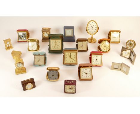 A collection of miniature novelty clocks, together with traveling alarm clocks, having manual and quartz movements. (3) 