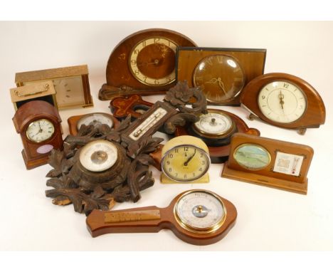 A collection of mid 20th century mantel clocks and barometers, having manual and quartz movements. (3) 