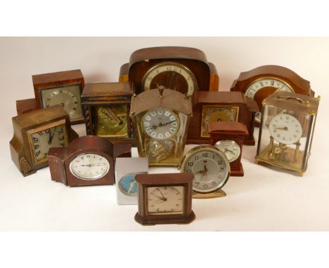 A collection of mid 20th century mantel clocks and barometers, having manual and quartz movements. (3) 