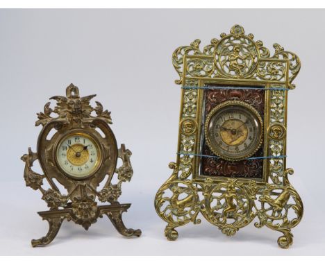 An early 20th century brass eazel mantel clock by British United Clock Co, having 8 day movement, 26cm tall, together with a 