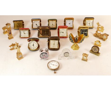 Two boxes of miniature novelty clocks, together with traveling alarm clocks, having manual and quartz movements. (2) 
