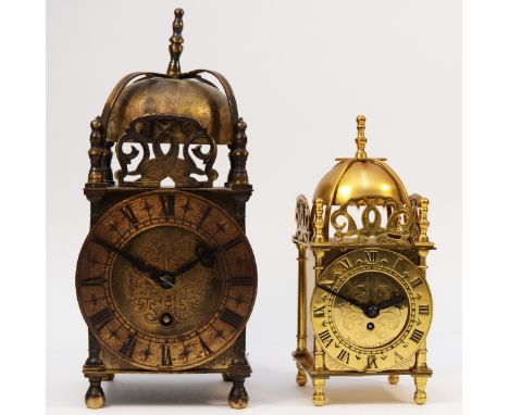 Two 20th century brass cased lantern mantel clocks, made in Great Britain by Smiths, having 8 day movements, 24 &amp; 17cm ta