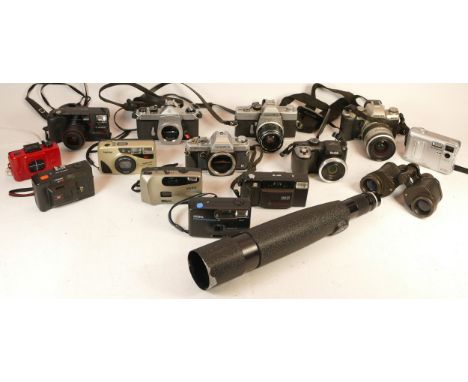 Two boxes of cameras and accessories to include ten compact cameras, filters and vintage film SLR cameras such as a Minolta, 
