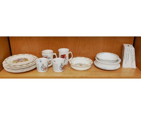 A collection of Royal Doulton Bunnykins/Wedgewood Peter Rabbit ceramic pieces, comprising of twenty four items dating from th