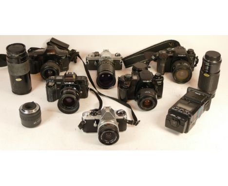 A collection of cameras and accessories to include lenses, exposure meters, two Pentax vintage film SLR cameras and four Mino