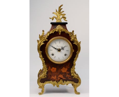 A 20th century Italian Imperial Rococo style 8 day mantel clock, with German movement striking on two bells. 38cm tall. 