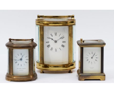 A 20th century brass carriage clock, of oval form having enamelled dial with Roman numerals, the 8 day movement stamped Made 