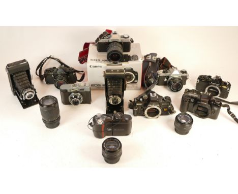 A collection of mixed cameras and accessories to include two digital compact cameras and six vintage film SLR cameras which i