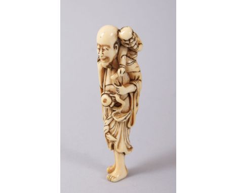 A GOOD JAPANESE EDO PERIOD CARVED IVORY NETSUKE OF A SENNIN, stood with an Oni upon his shoulder, 9.1cm.