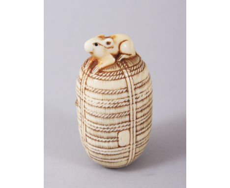 A GOOD QUALITY JAPANESE EDO / MEIJI PERIOD CARVED IVORY NETSUKE OF A RAT UPON RICE BALE, the top with a resting rat, the cent