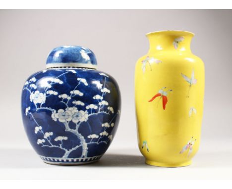 A FINE QUALITY 19TH/20TH CENTURY CHINESE YELLOW GROUND FAMILLE ROSE PORCELAIN LANTERN VASE, painted with scattered butterflie