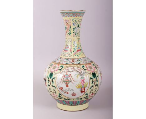 A GOOD 19TH CENTURY CHINESE FAMILLE ROSE ENAMELLED PORCELAIN VASE, decorated upon a yellow ground profusely with scenes of na