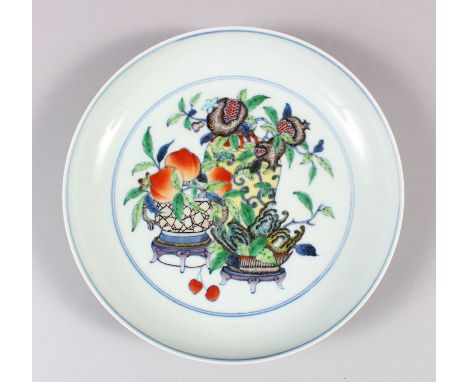 A CHINESE POLYCHROME ENAMEL PORCELAIN DISH, decorated with scenes of flowers and fruit in baskets, six-character mark to base