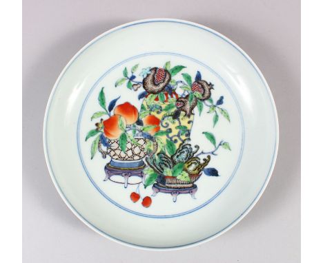 A CHINESE POLYCHROME ENAMEL PORCELAIN DISH, decorated with scenes of flowers and fruit in baskets, six-character mark to base