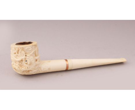 A FINE QUALITY JAPANESE CARVED IVORY PIPE IN ITS BOX, with a gold band on the stem, carved with a three clawed dragon around 