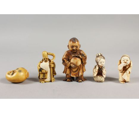 A GROUP OF FIVE JAPANESE CARVED IVORY NETSUKE / OKIMONO, including one of the seven lucky gods - Fukurokuju holding his staff