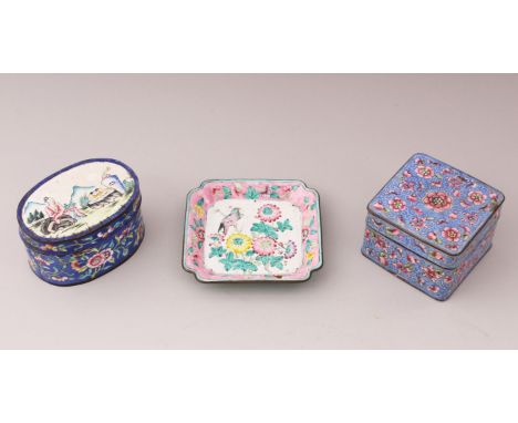 TWO CHINESE ENAMEL BOXES WITH A CHINESE ENAMEL TRAY, decorated with scenes of birds, flora and figures in garden settings, 20
