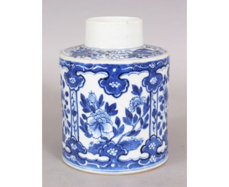 A 19TH CENTURY CHINESE BLUE &amp; WHITE PORCELAIN TEA CADDY, the sides of the cylindrical body painted with a variety of flor