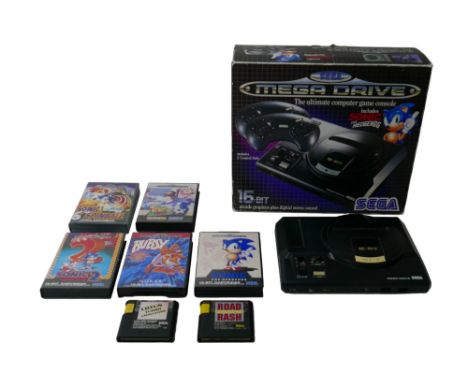 A 1990s Sega Megadrive Sonic the Hedgehog edition console pack, with Sonic game, two controllers and original box, together w